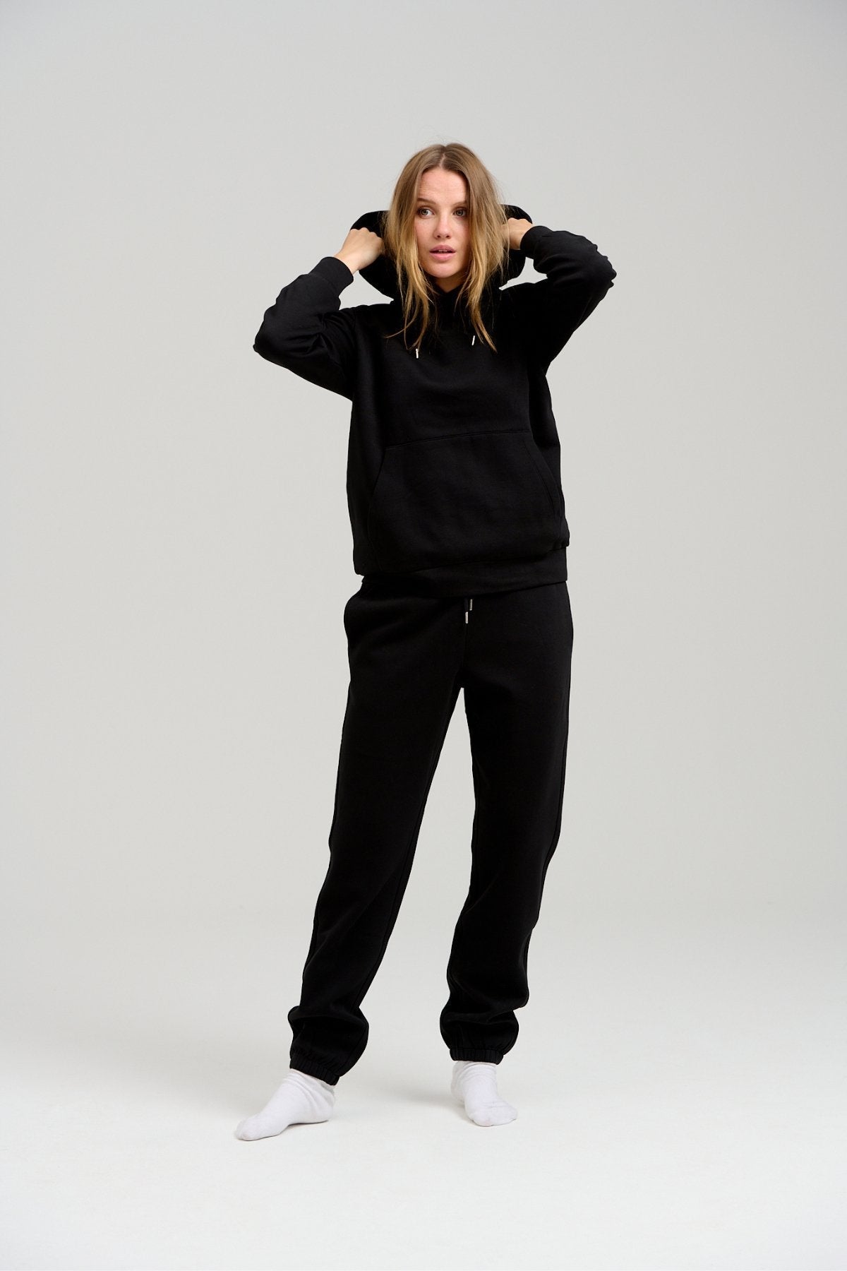 Black sweatsuit on sale